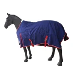 Winter horse blanket in navy blue with red trim on a model horse