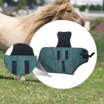 Winter horse blanket in green with black straps on a running horse